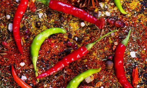 Spices and spicy chili peppers, top view